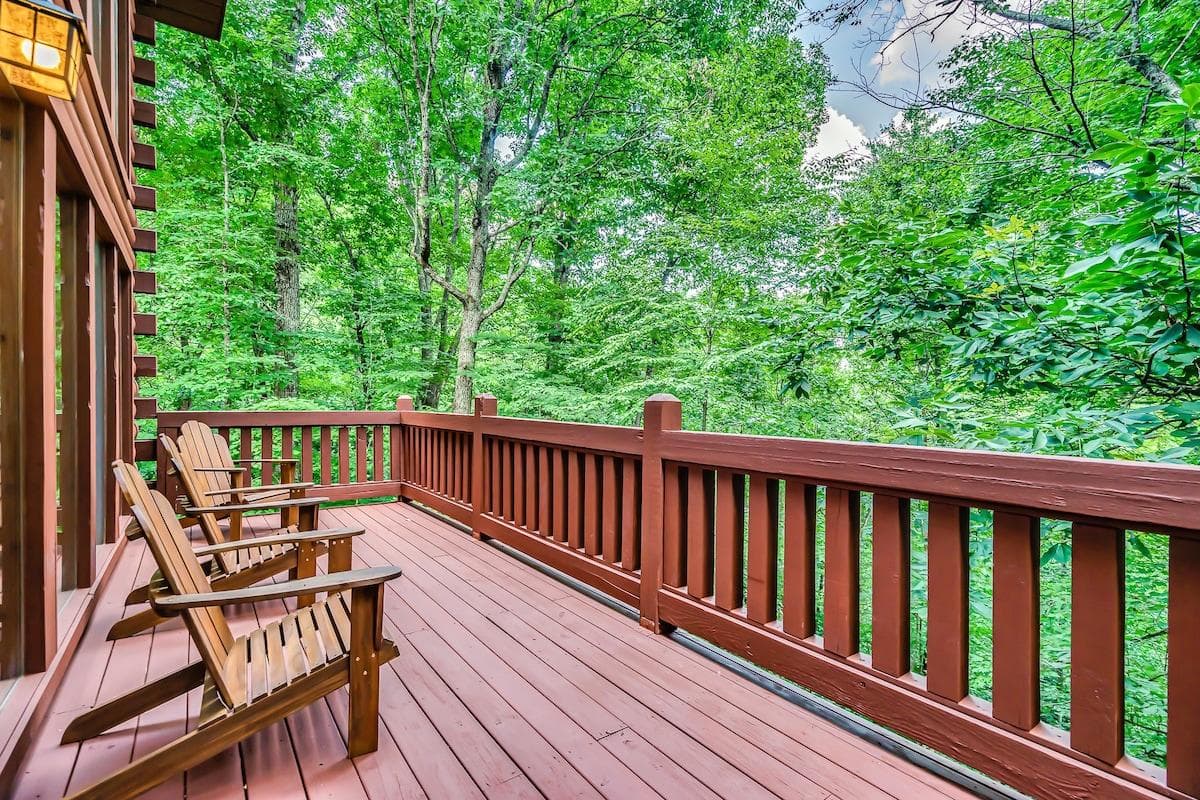 Imagine yourself drinking a cup of coffee on this beautiful deck  furnished with durable polywood chairs and tables, as you enjoy the peaceful views of the trees and their leaves shimmering in the breeze