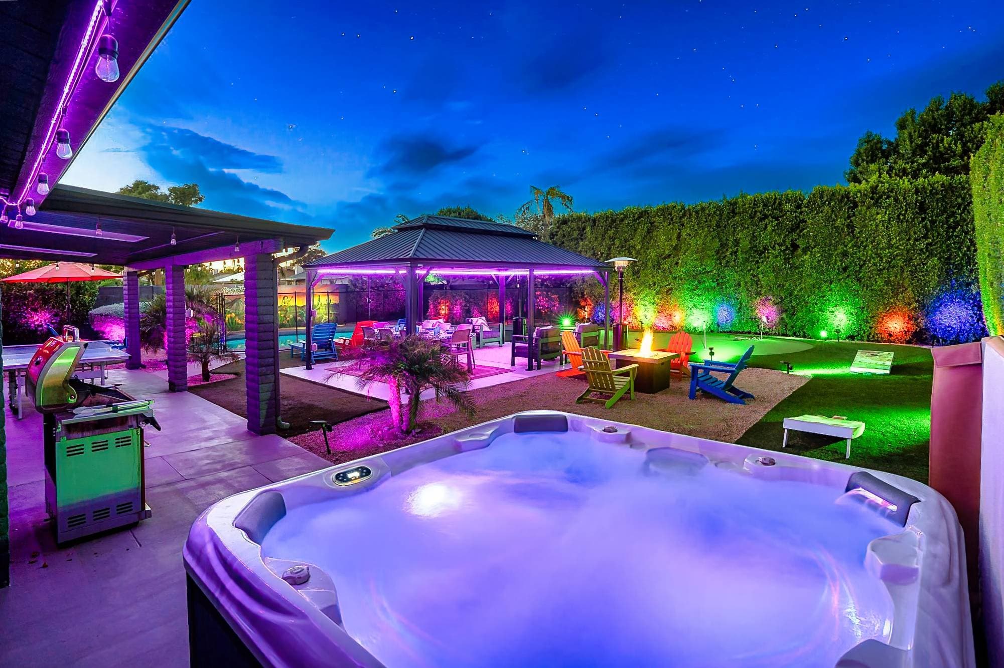 Our backyard includes a heated pool w/ safety gate, custom mural, pickleball court, hot tub, fire pit, propane gas grill, corn hole, 3 hole putting green, gazebo w/ outdoor dining table, 50 LED solar lights, patio heaters, and a ping pong table.