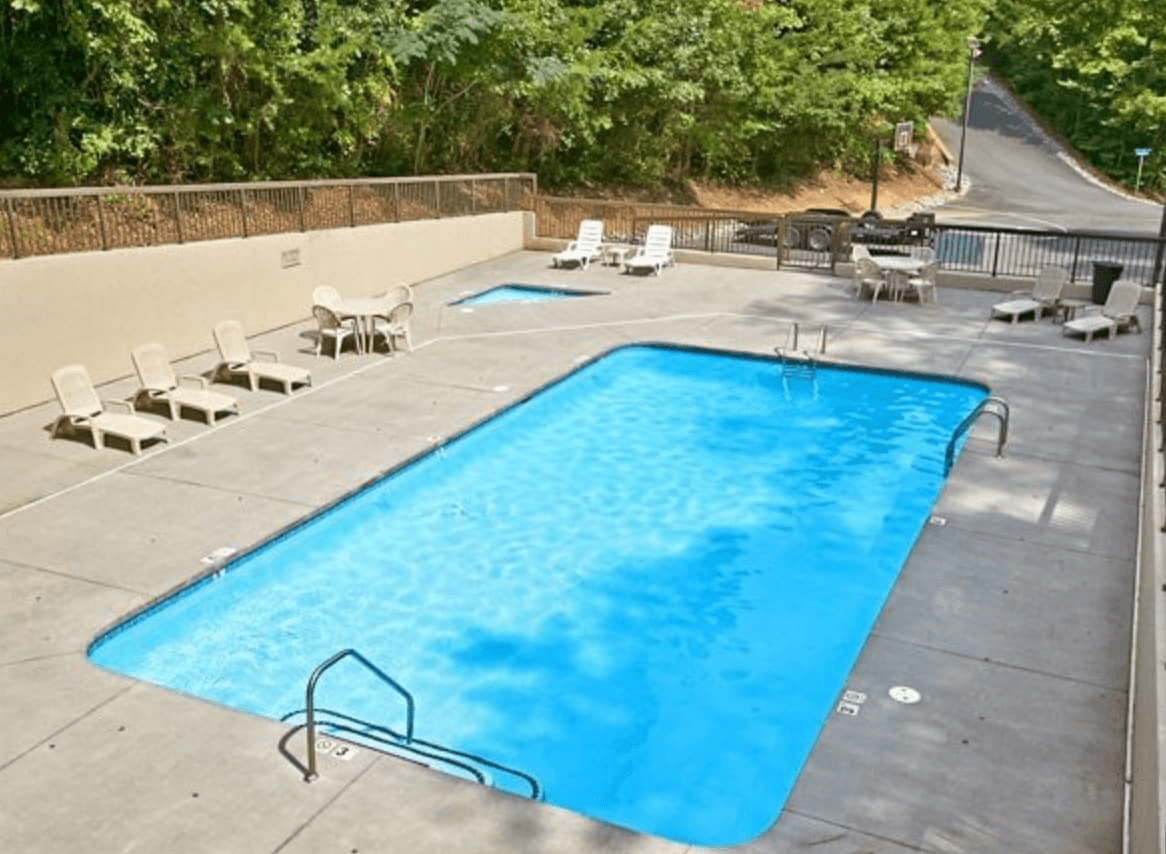 Heated community pool that is only a short walk from the cabin. It is open from 10am - 10pm starting the weekend before Memorial Day thru Labor Day. The basketball court is on the other side of the fence.