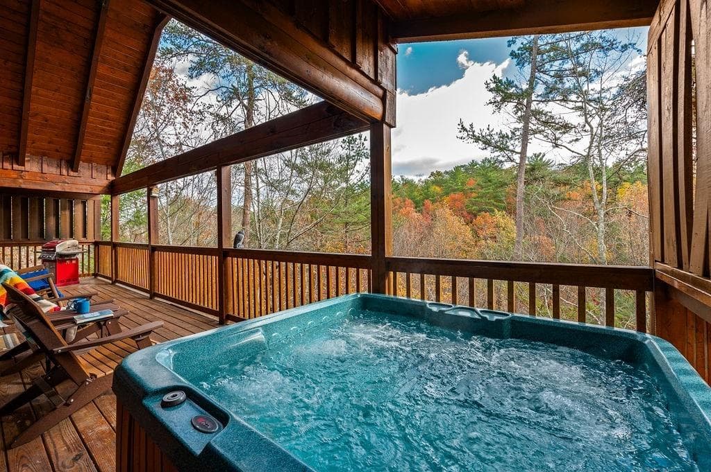 Enjoy ultimate relaxation in the hot tub, savor a meal from the gas grill, or kick back in a comfortable chair on the wraparound deck, all while taking in the tranquil wooded view.